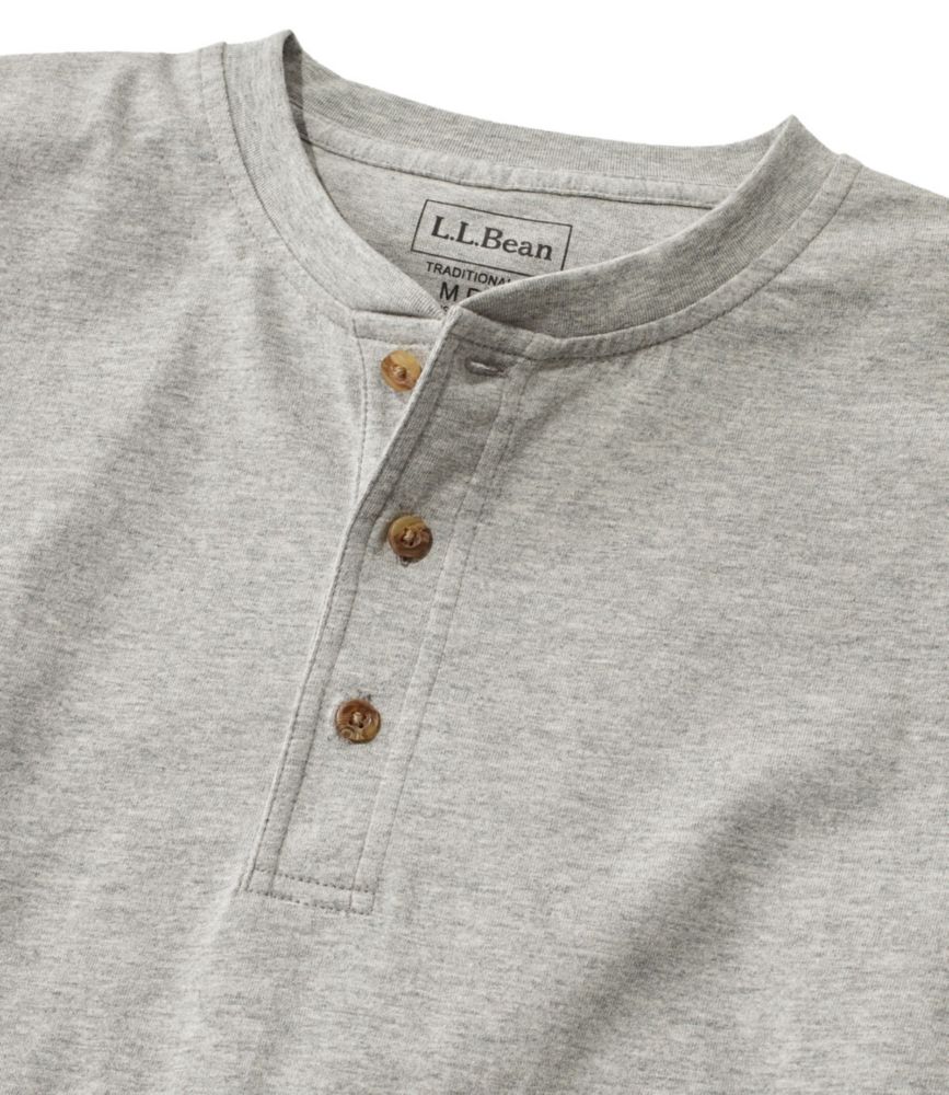 Men’s gray heather cotton long-sleeve Henley tee close-up showing crew neckline and three-button placket.