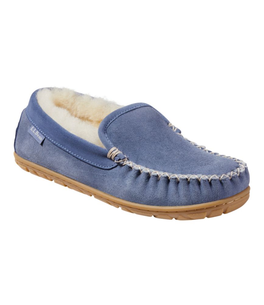 Women’s charcoal blue suede Venetian slipper with shearling lining and tan rubber sole, shown at a side angle.