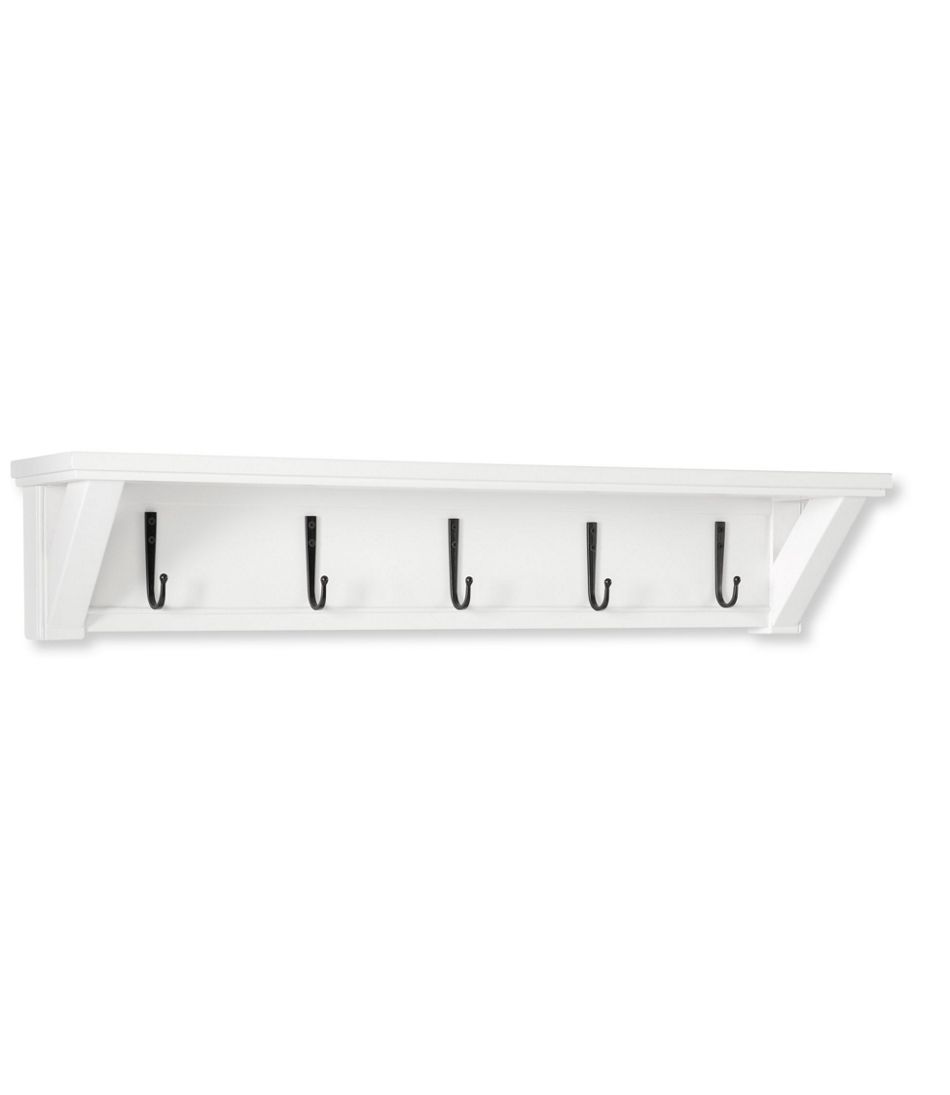 large white shelf with hooks