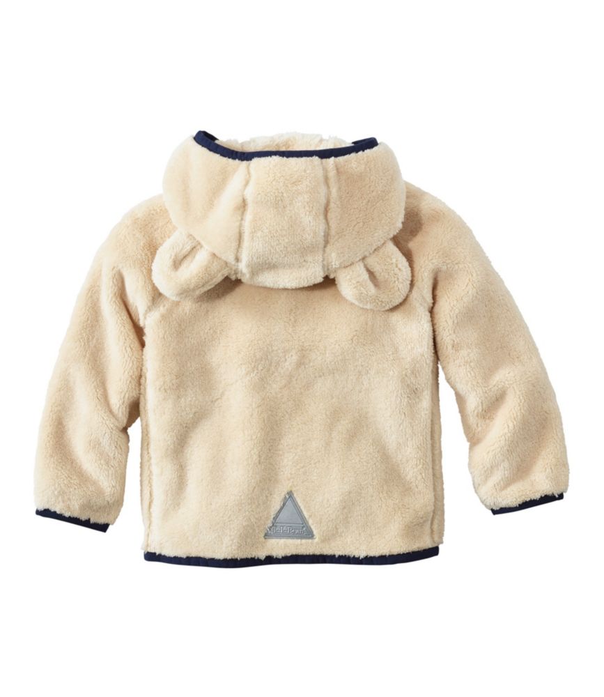 Toddlers’ tan hi-pile fleece jacket shown from back with hood and bear ears, navy trim and reflective back patch.