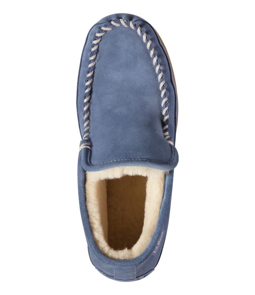 Women’s charcoal blue suede moccasin slipper with plush shearling lining, shown from top view.