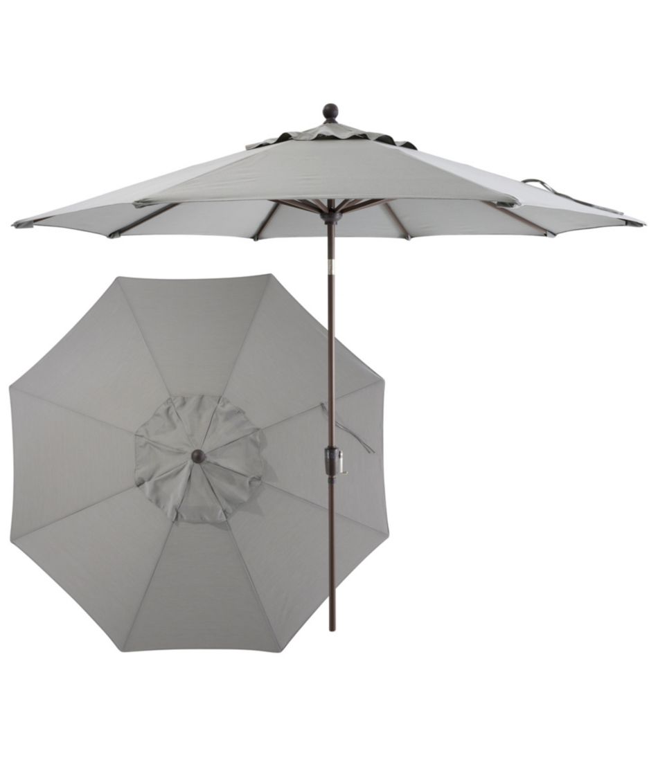 9 foot tall patio umbrella Cabana ft. Table with tilt and crank features Designed with style and durability in mind Weather-Resistant 9' Market Umbrella, Push
