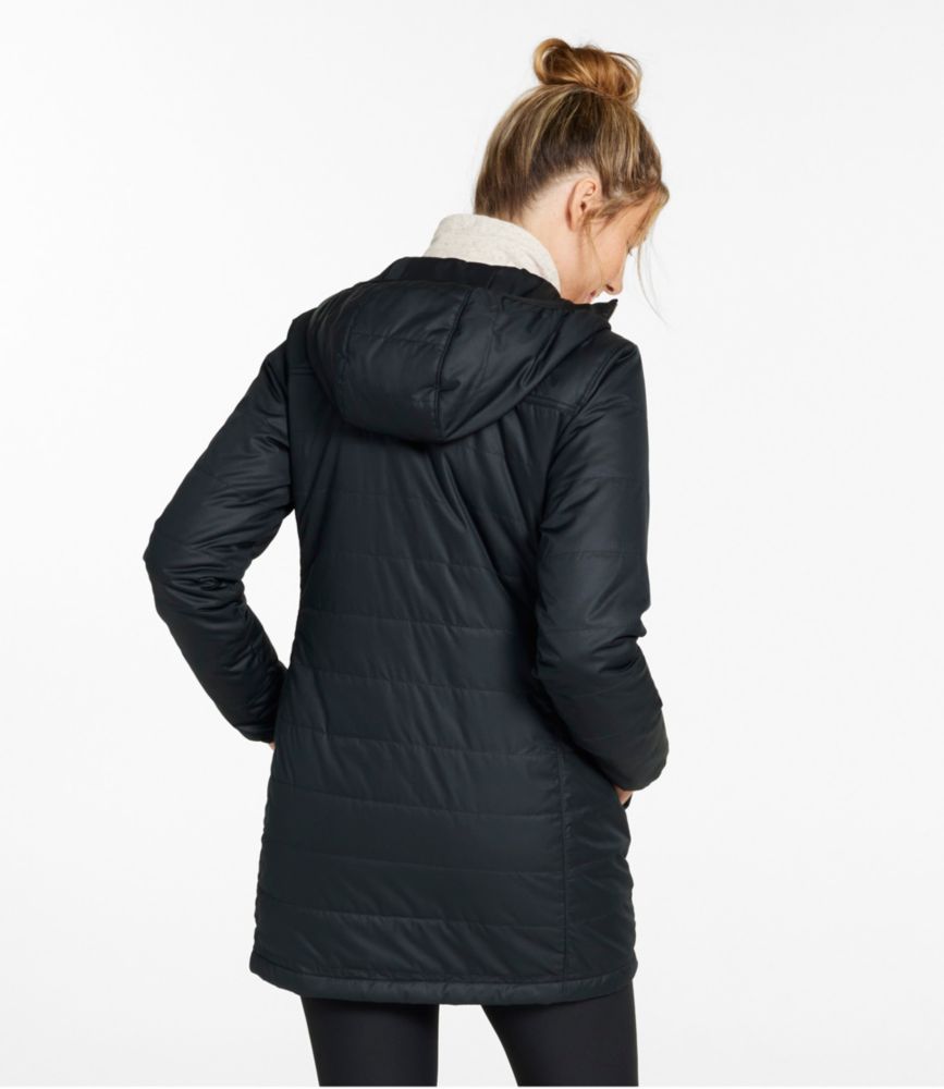 Women’s black thigh-length puffer coat with hood, shown from the back on a standing model.
