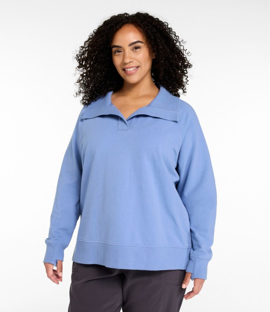 Women’s blue splitneck pullover sweatshirt with long sleeves and wide collar, shown worn from the front.