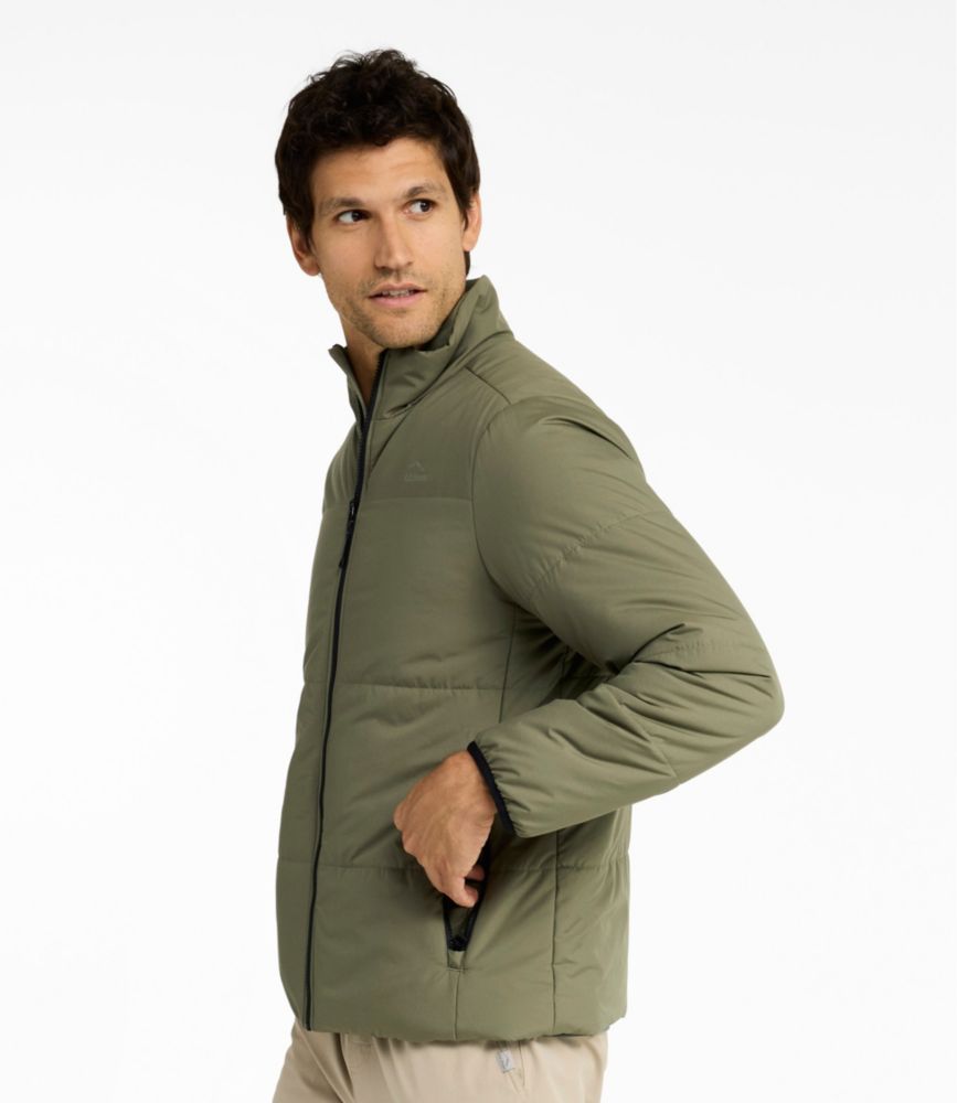 Men's olive gray puffer jacket with stand collar and zip front, shown on model in side view with hand in zip pocket.